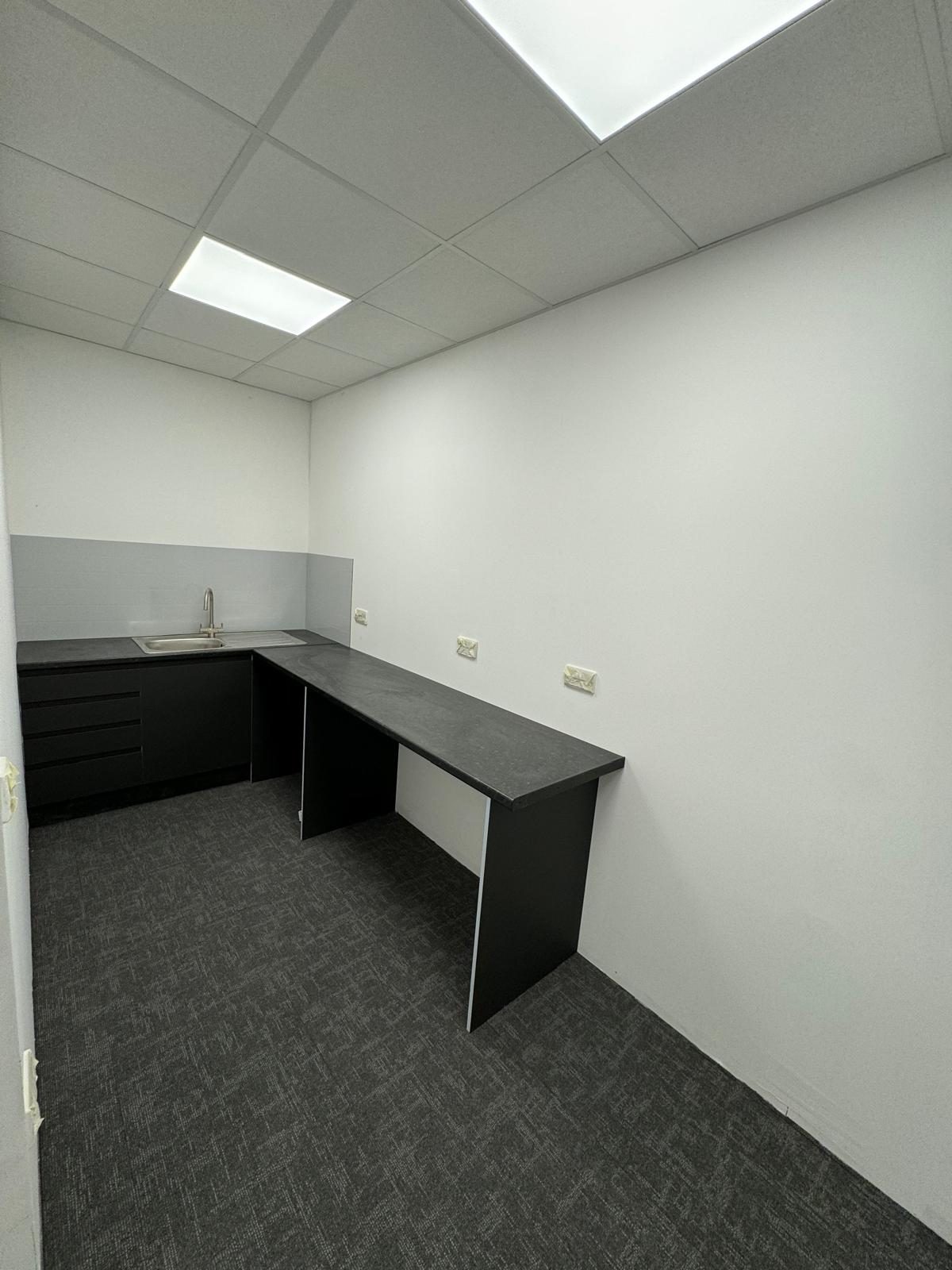 Fitted kitchen & tea-point, HM Car Sales, JLG Construction Services