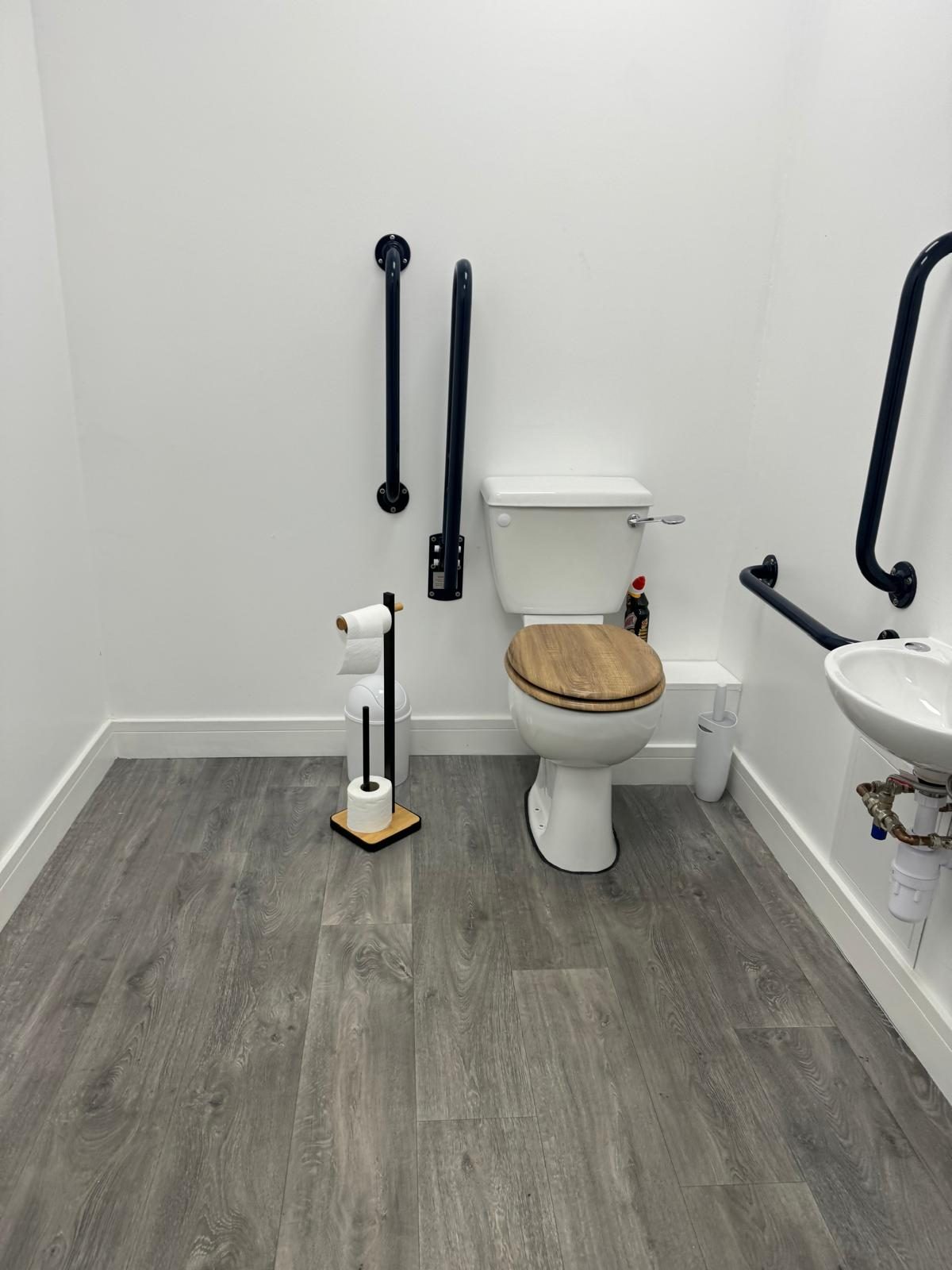 Accessible WC, HM Car Sales, JLG Construction Services