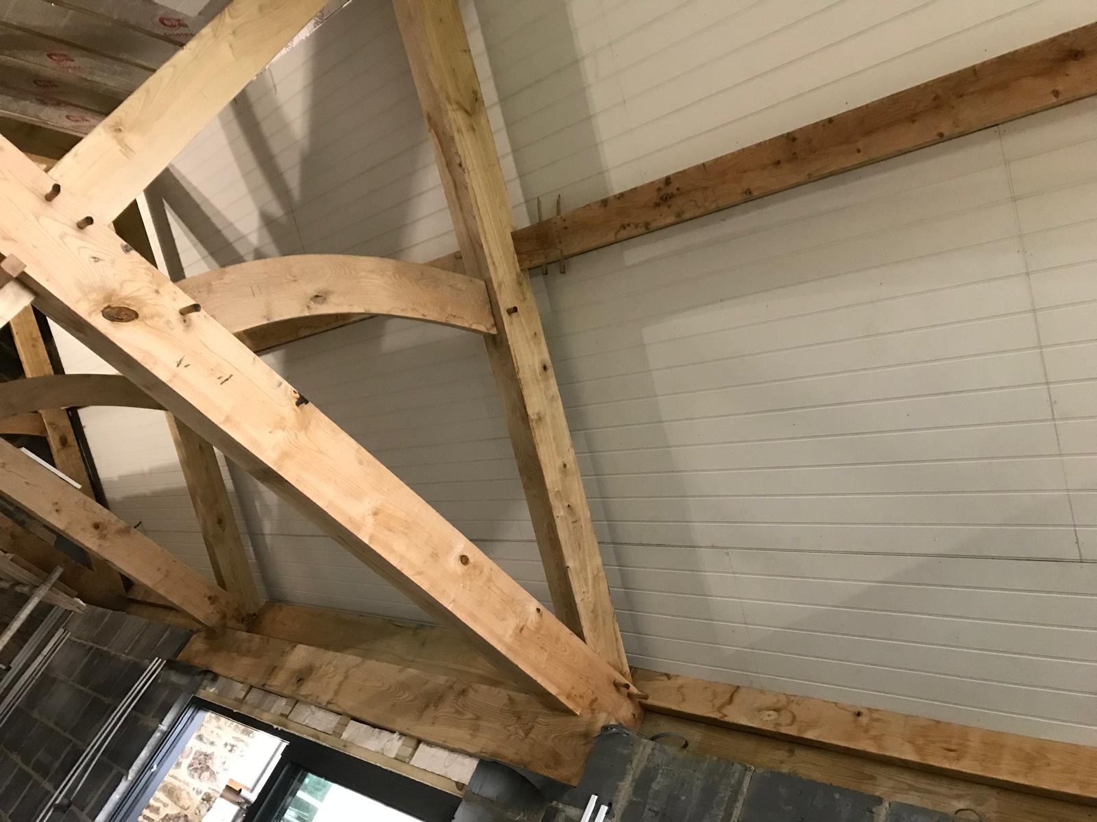 Curved oak brace and pegged joints, Oak-Framed Farmhouse Extension, JLG Construction Services