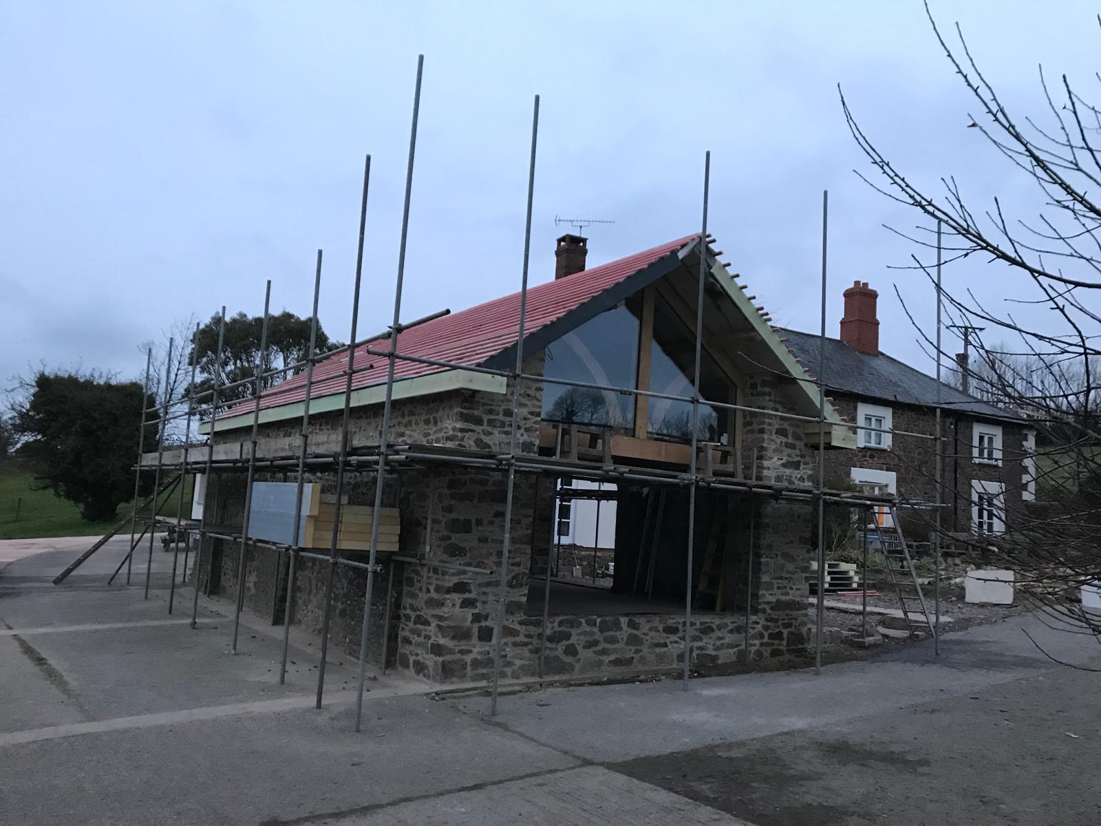 The extension taking shape alongside the farmhouse, Oak-Framed Farmhouse Extension, JLG Construction Services