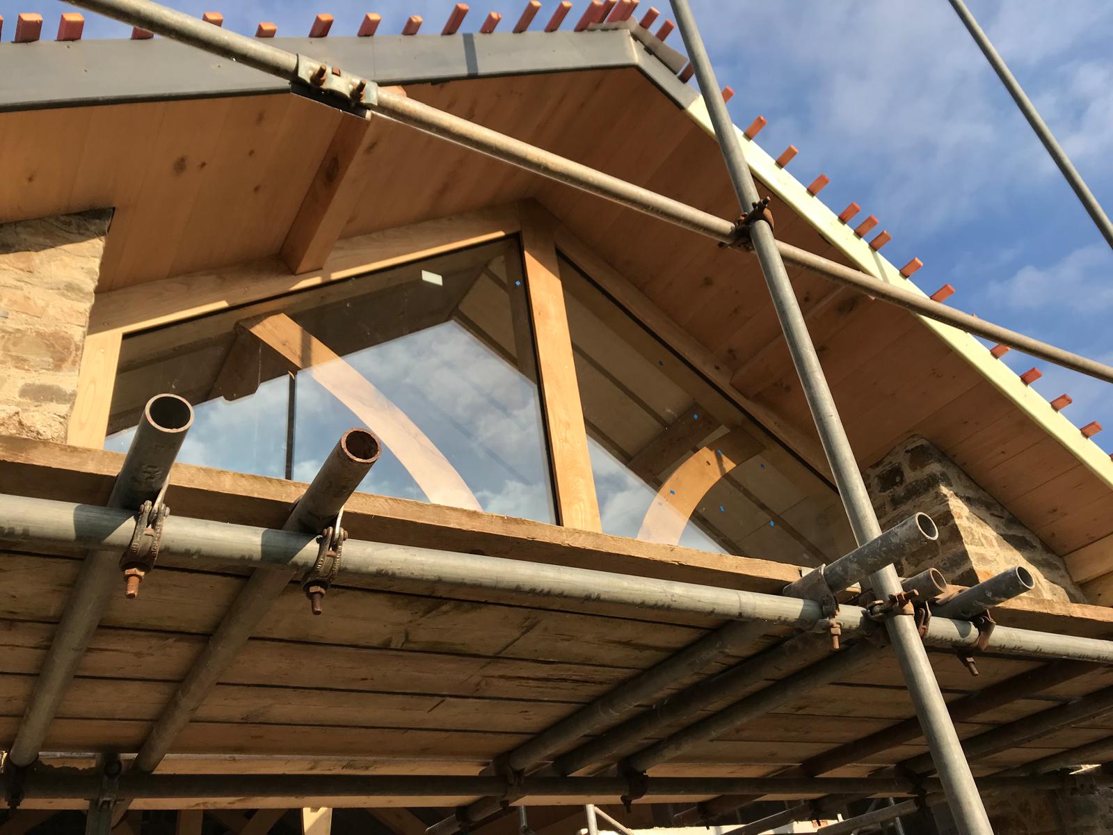 Glazing fitted around the oak frame at the apex, Oak-Framed Farmhouse Extension, JLG Construction Services