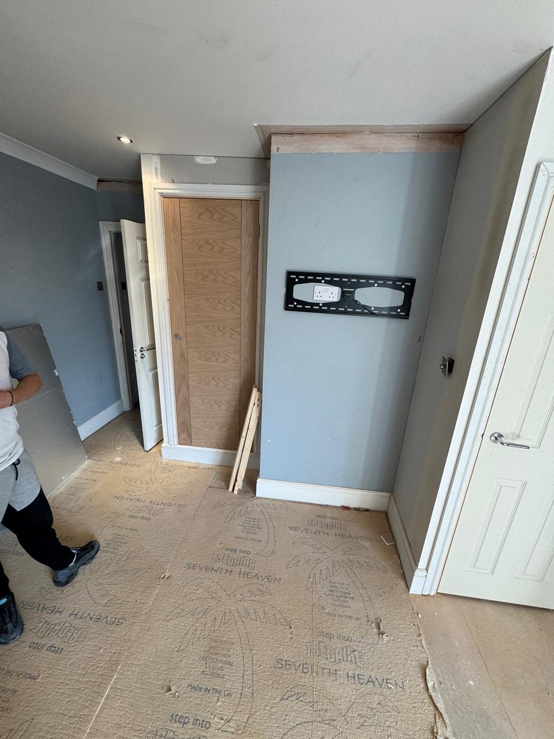 Bedroom mid-renovation with the fitted storage taking shape, JLG Construction Services