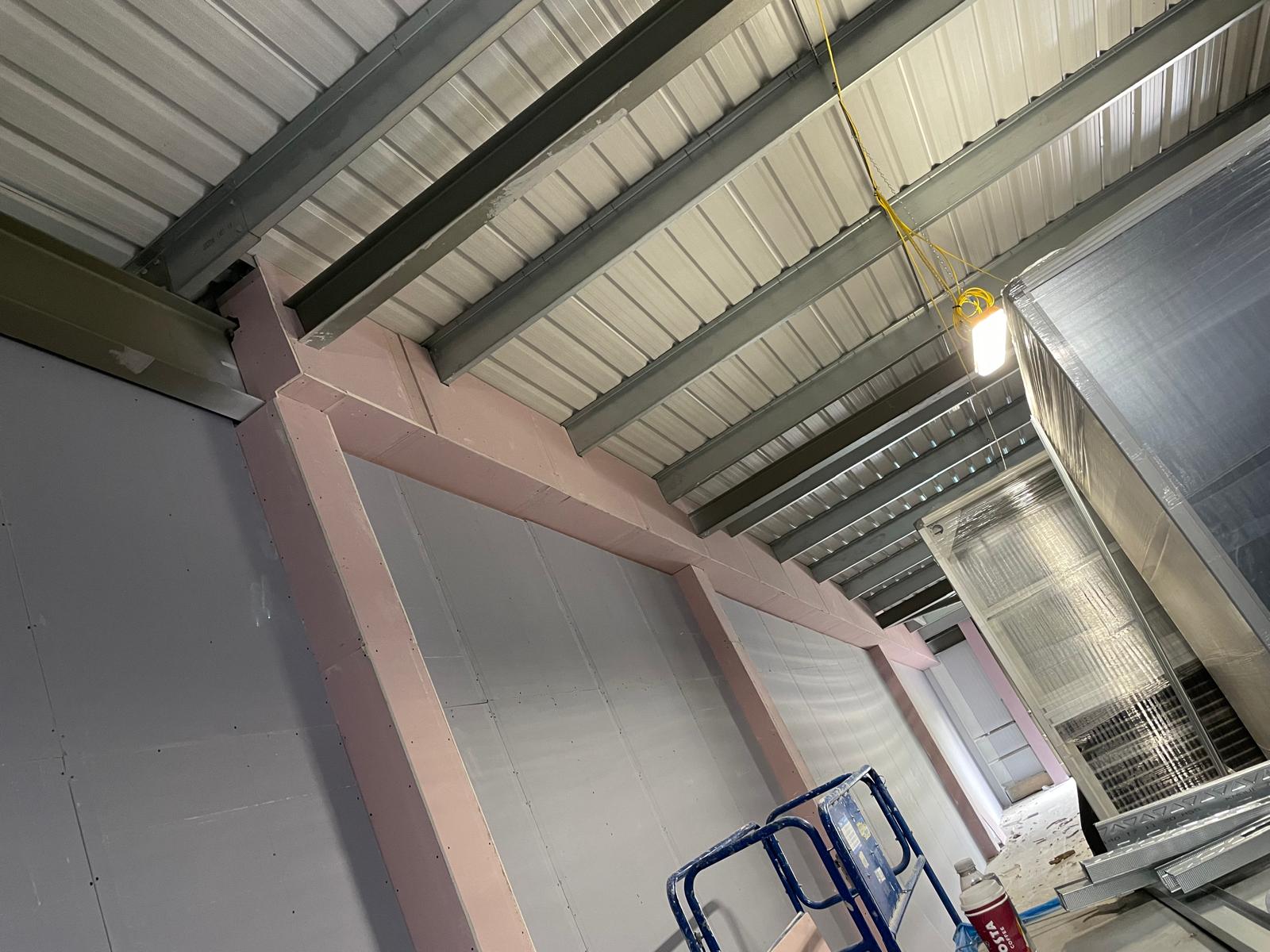 Boarding out around the steelwork, Tarka Leisure Centre, JLG Construction Services