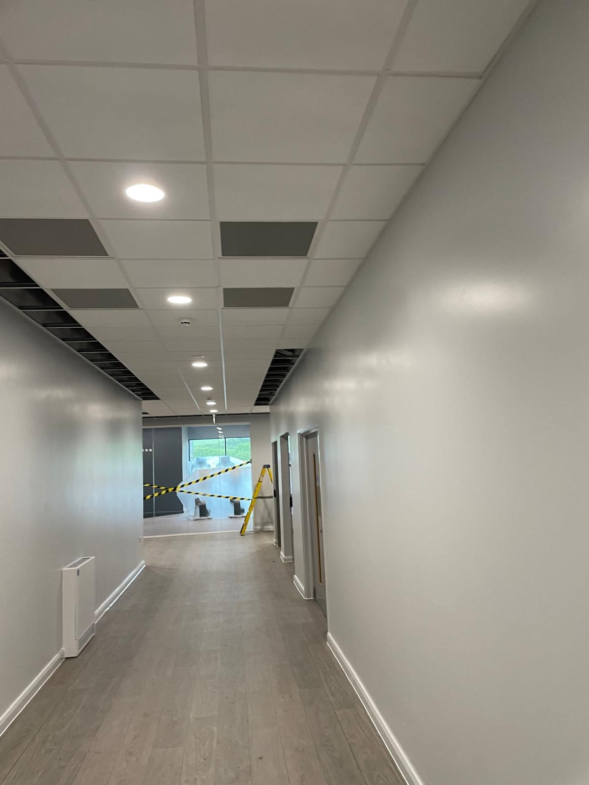 Corridor — ceiling works part complete — Tarka Leisure Centre, JLG Construction Services