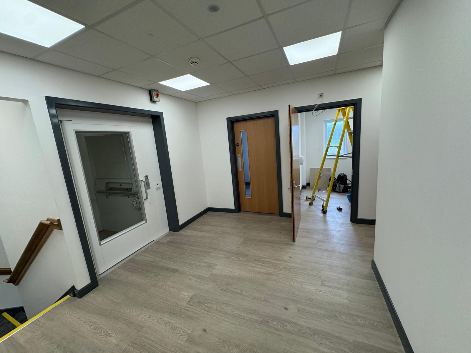 Finished corridor, LVT flooring, Wales & West, JLG Construction Services