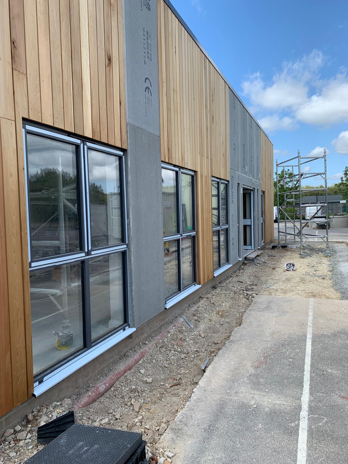 Cladding and boarding around the new windows, Wimborne School, JLG Construction Services