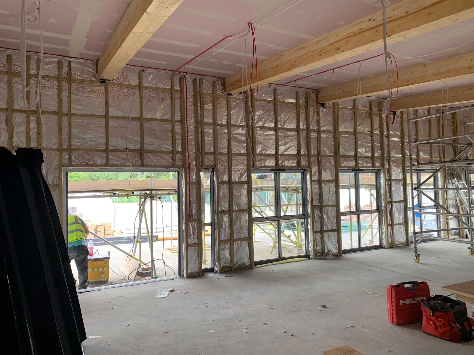 Insulation and vapour-control layer to the external walls, Wimborne School, JLG Construction Services