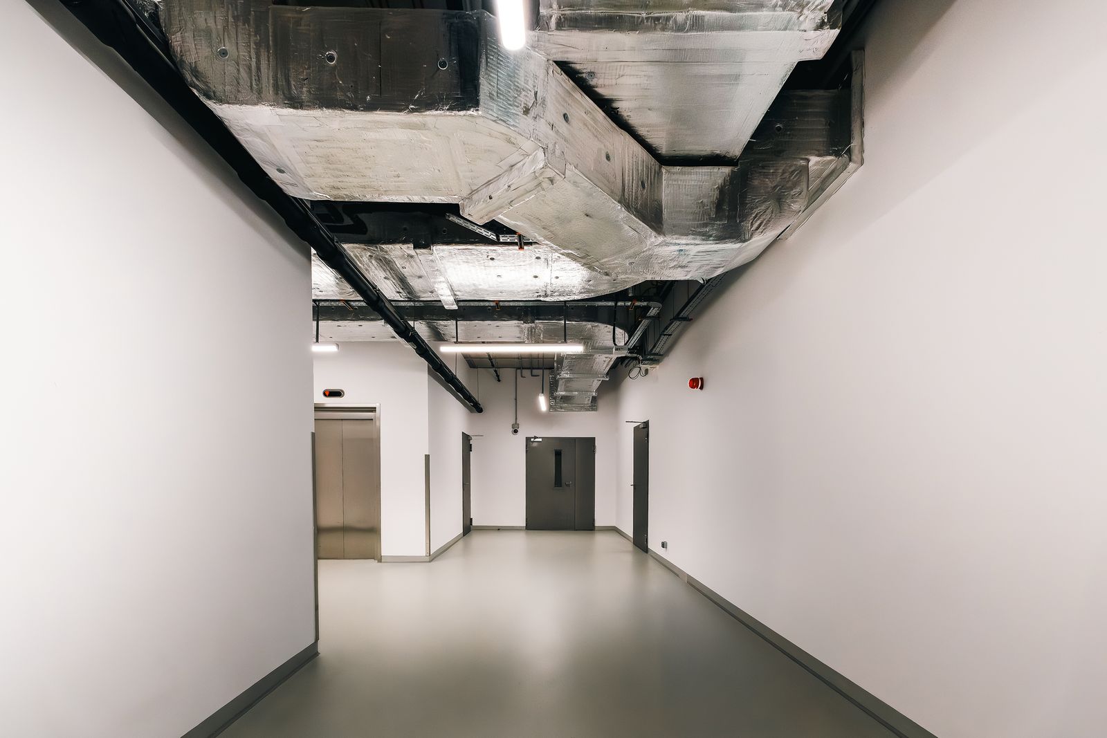 Drylining and ceiling services to a commercial corridor